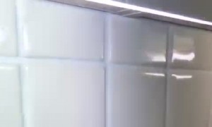 Kitty Attacks Kitchen Tile