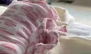 Sleeping Baby Comfortable In Strange Position