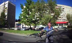 Man Attacks Car with Bicycle