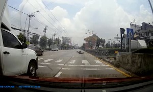 Motorcycle Runs Out of Room as Traffic Stops
