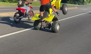 Man on Yellow Four-Wheeler Pulls Impressive Stunts