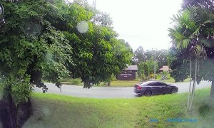 Motorcyclists Cuts off Truck Merging Lanes