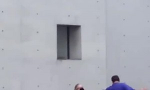 Woman in wheelchair dances with partner at concert