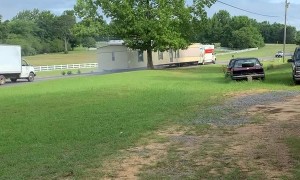 People Try Moving House Using U-Haul Truck and Trailer