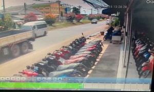 Traffic Cone Sign Protects Mopeds From Water Tank
