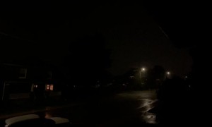 Close Lightning Strikes Lights up Street