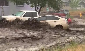 Intense Flooding Carries Cars Away