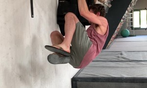 Rock Climber Practicing One Finger Hang