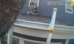 Police rescue family and their pets from house fire