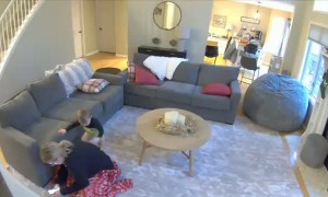 Baby Bonks Mom with a Book