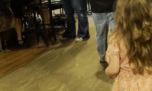 Little Girl Meets Santa on Vacation