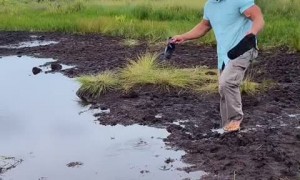 Dude unknowingly falls into crazy hidden sinkhole 