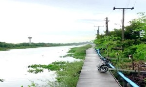 Guys Ride on Fast Canoe