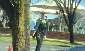 Dancing Cop Entertains Aussie Drivers During Lockdown