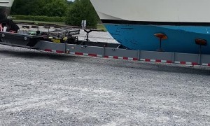 Truck Transporting Giant Boat