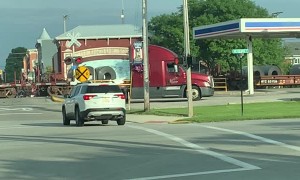Train Plows Through Semi Stopped on Level Crossing
