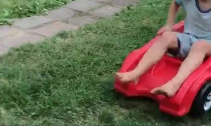 Cool Kiddo Gets Clotheslined by Cardboard
