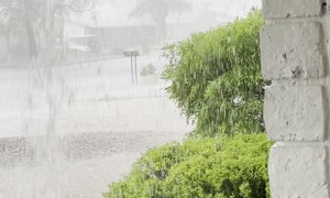 River Pours From Roof During Monsoon Rain