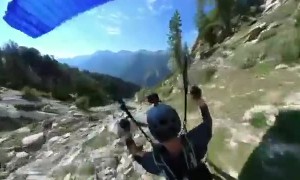 Paraglider Flies and Flips Over Rocks