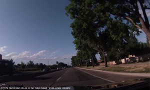 Train Horn in a Small Car Surprises Red Light Runner