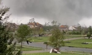 Man and Dog Make it to Safety Moments Before Devastating Tornado Hits
