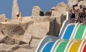 Man Descends Waterslide in Style