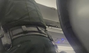 Woman Removed From Plane After Smoking Mid-Flight Cigarette