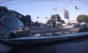 Car Runs Red Light, Narrowly Misses Traffic