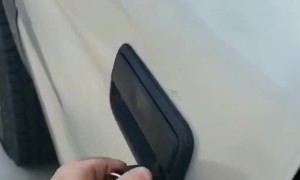 Improvising for a Broken Door Handle on a Truck