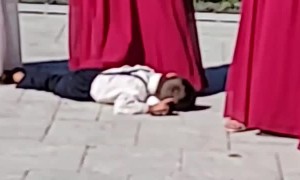 Tired Ring Bearer Takes Nap on Pillow After Successful Delivery