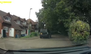 Scootering Kid Shoots Out In Front Of Car