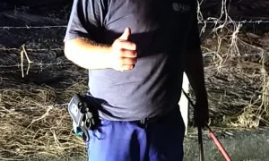 Cobra Rescued from Fishing Net Stuck in Barbed Wire Fence