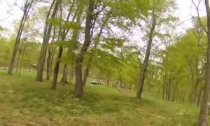 Girl Wearing Helmet Cam Encourages Horse During Competition