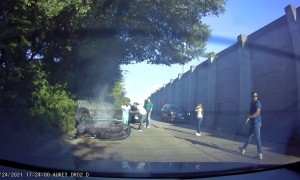 Upside-Down Car Slides Down Roadway
