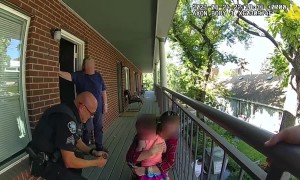 Little girl with head stuck in railing rescued by police