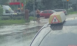 Guy Kicking Water at Cars Receives Instant Karma