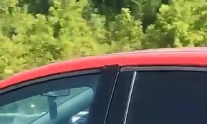 Car Riddled With Bullet Holes