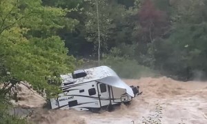 Camp Trailer Stuck in River Flood Waters