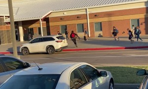 Mom Sings at Son as He Sprints into School