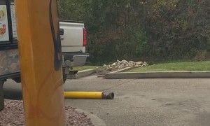 Truck in Taco Bell Drive-Through Takes Out Pole