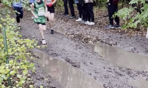 Athlete Dives Into Mud Puddle During Race