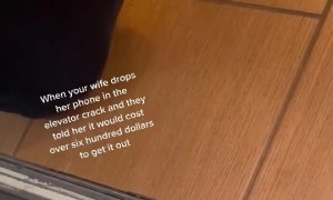 Taped Stick Saves Phone From Elevator Shaft