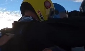 Skydivers' plane goes into free fall and spins past them after it stalls