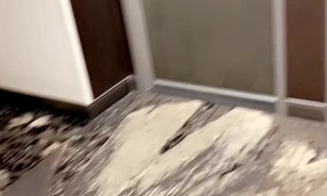 Shoeless Stranger Snores in Hotel Hallway