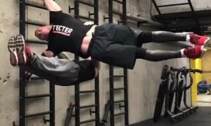 Two Men Complete an Impressive Human Flag Stunt