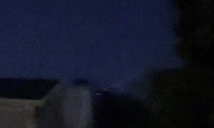 Debris Falling Through the Night Sky