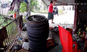 Motorcycle Rider Has Close Call With Falling Door