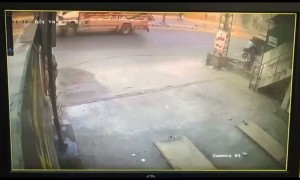 Two Guys Riding Motorcycle Lose Control and Crash into Wall