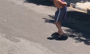 Dad Helps Mermaid Across the Street