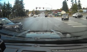 Attempt to Beat Yellow Light Ends in Crash in Front of Cop